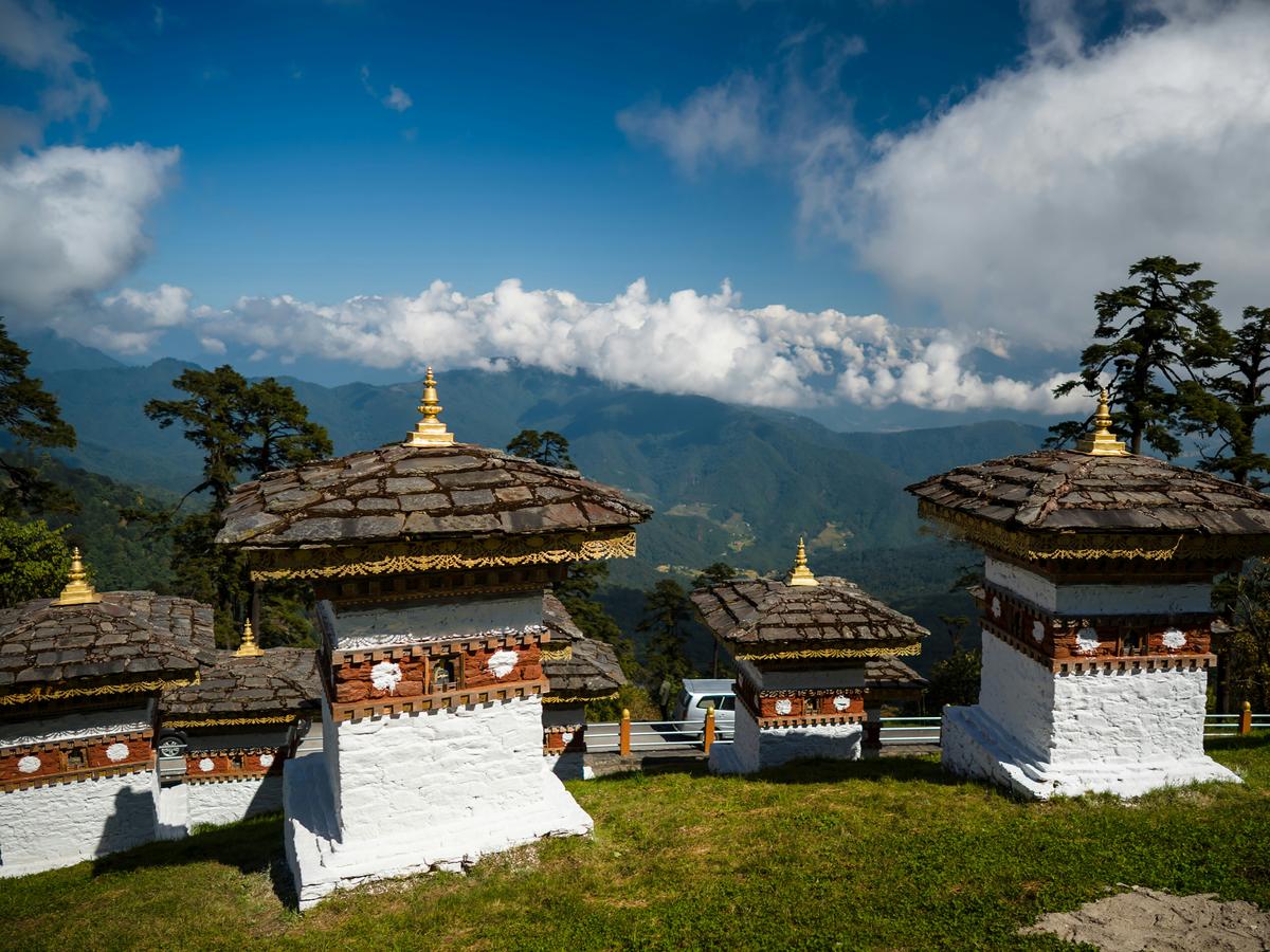 https://image-delivery.himalayanrides.com/Vh-Cycx9dJJ5XsIZhMMI_w/motorcycle-tours/bhutan-motorcycle-tour-gallery-5-1.jpg/w=1200,fit=scale-down,format=auto,quality=75